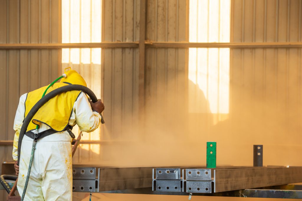 Common Surface Contaminants Found in Facilities and How Sandblasting Removes Them Safely
